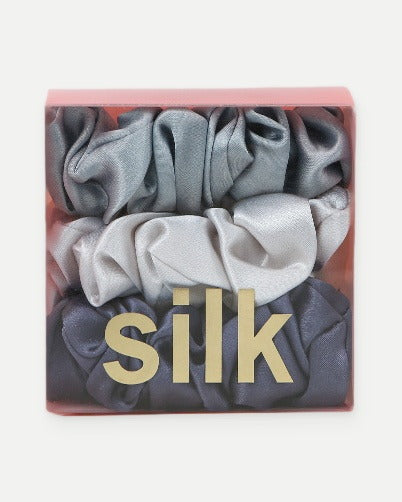 Darette The Understudy Scrunchie Set in Deep Blues - front view on a soft studio backdrop