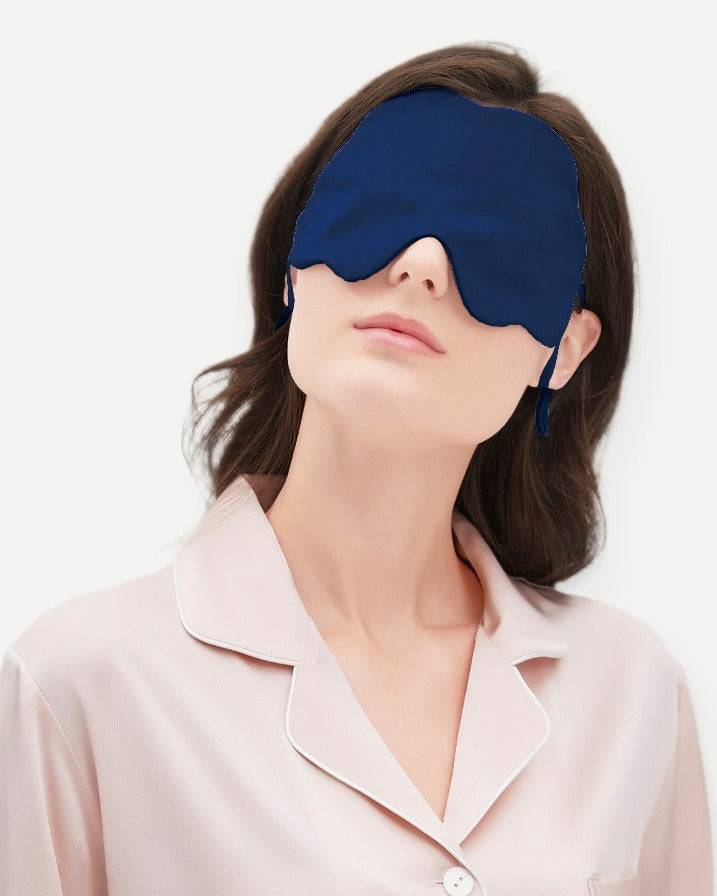 Darette Lights Out Silk Eye Mask in Sky - front view on a soft studio backdrop