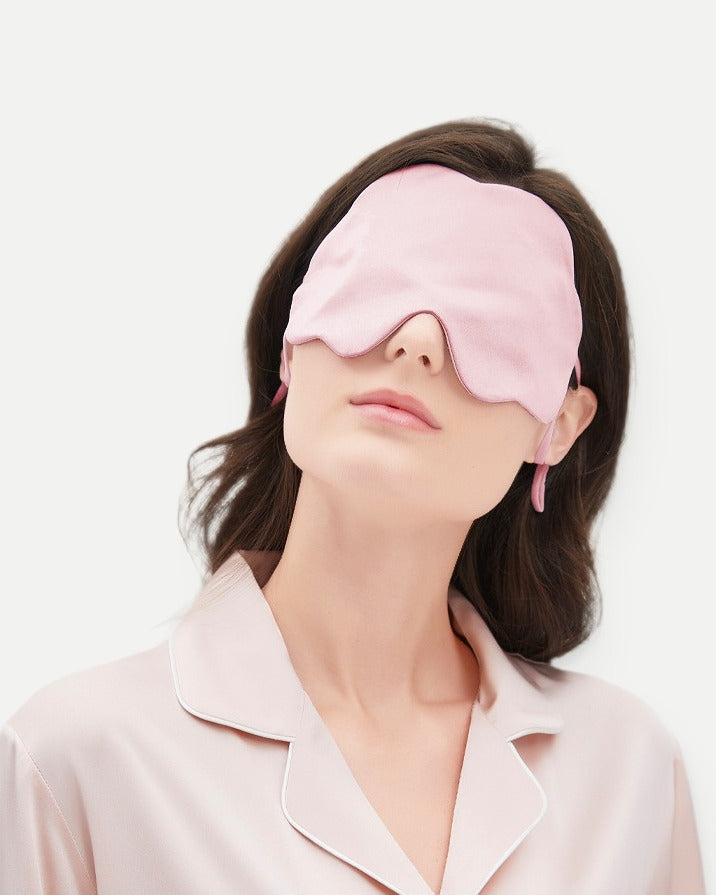 Darette Lights Out Silk Eye Mask in Blush - front view on a soft studio backdrop