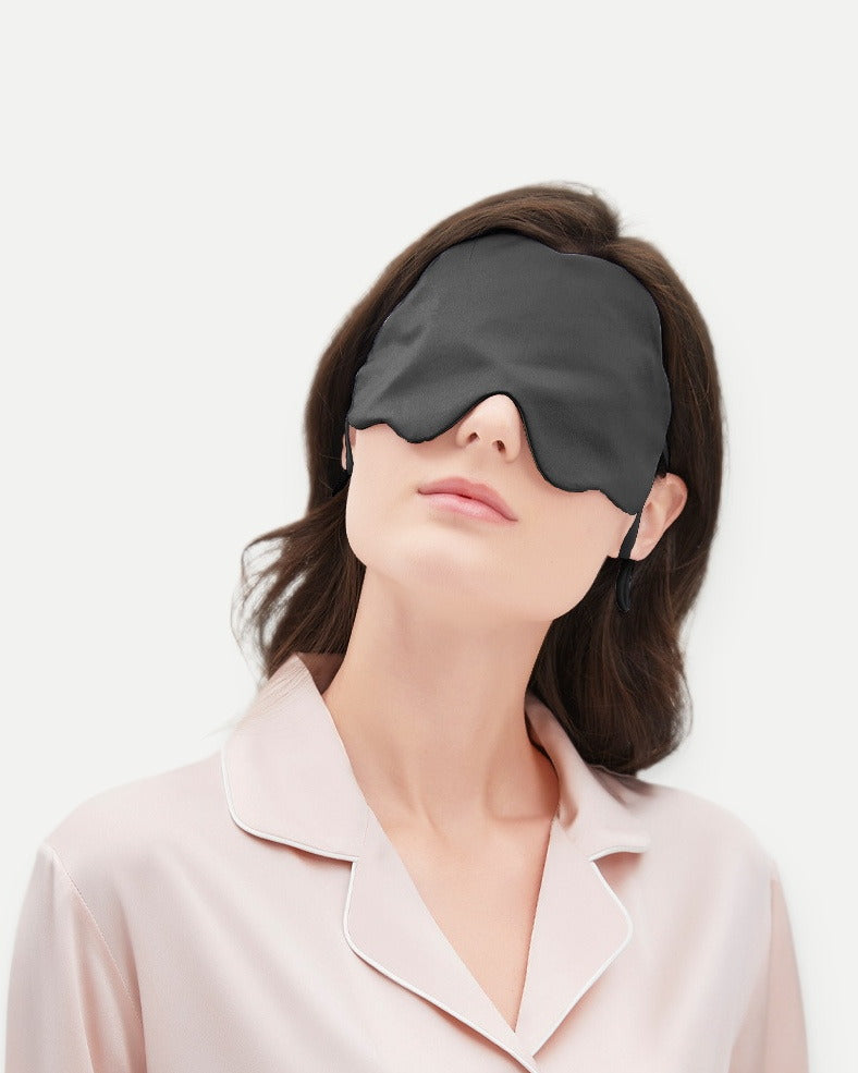 Darette Lights Out Silk Eye Mask in Mist - front view on a soft studio backdrop