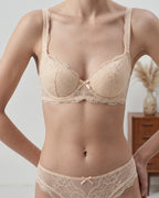 Candid lifestyle shot of the Darette Low Key Lace Set in Ivory