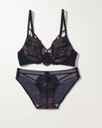 Flat lay of the Darette Quiet Yes Lace Set in Noir on a plain surface