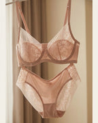 Candid lifestyle shot of the Darette Good Habit Lace Set in Blush
