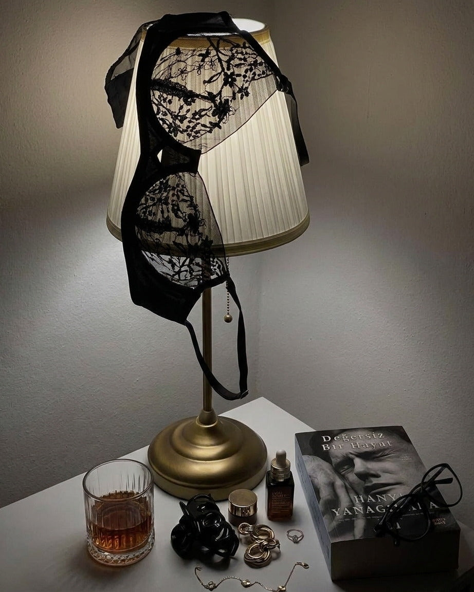 Candid lifestyle shot of the Darette Good Habit Lace Set in Noir