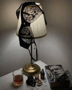 Candid lifestyle shot of the Darette Good Habit Lace Set in Noir