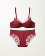 Flat lay of the Darette Good Habit Lace Set in Bordeaux on a plain surface