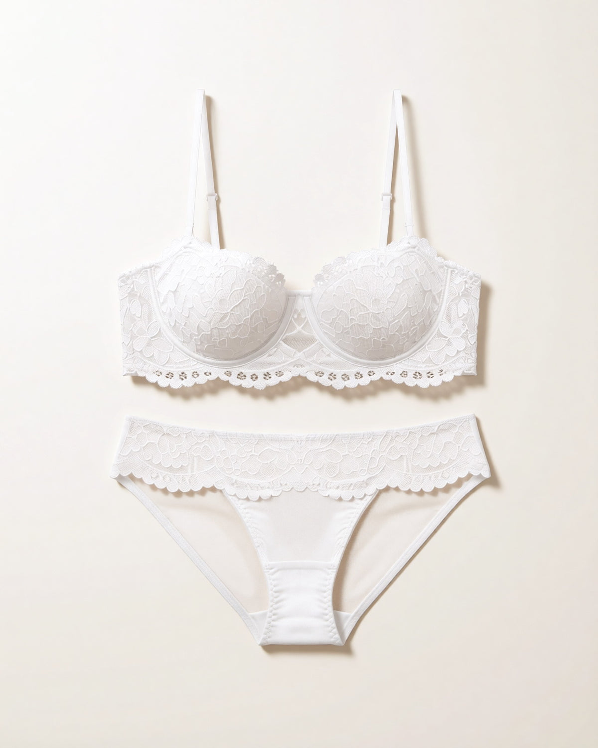 Flat lay of the Darette Half Truth Half-Cup Set in Ivory on a plain surface