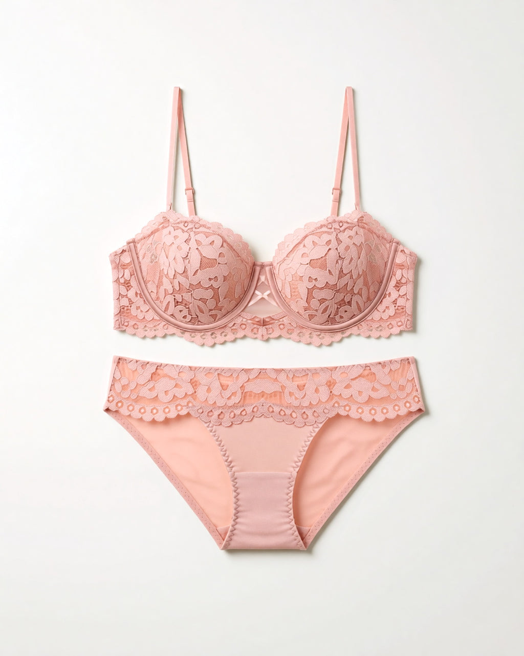 Flat lay of the Darette Half Truth Half-Cup Set in Blush on a plain surface