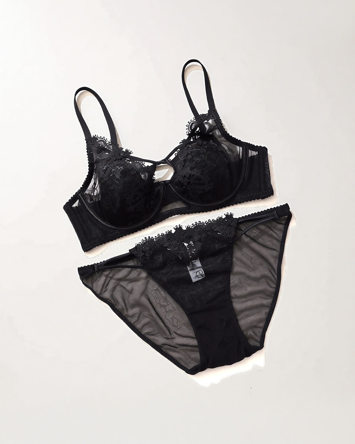 Darette The Undone Lace Set in Noir shown on its own against a plain background