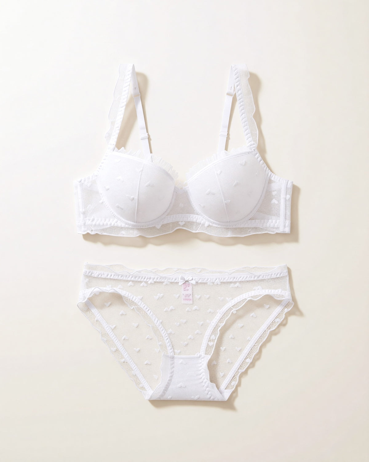 Darette Soft Spot Lace Set in Ivory - front view on a soft studio backdrop