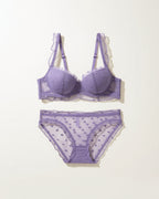 Flat lay of the Darette Soft Spot Lace Set in Mauve on a plain surface