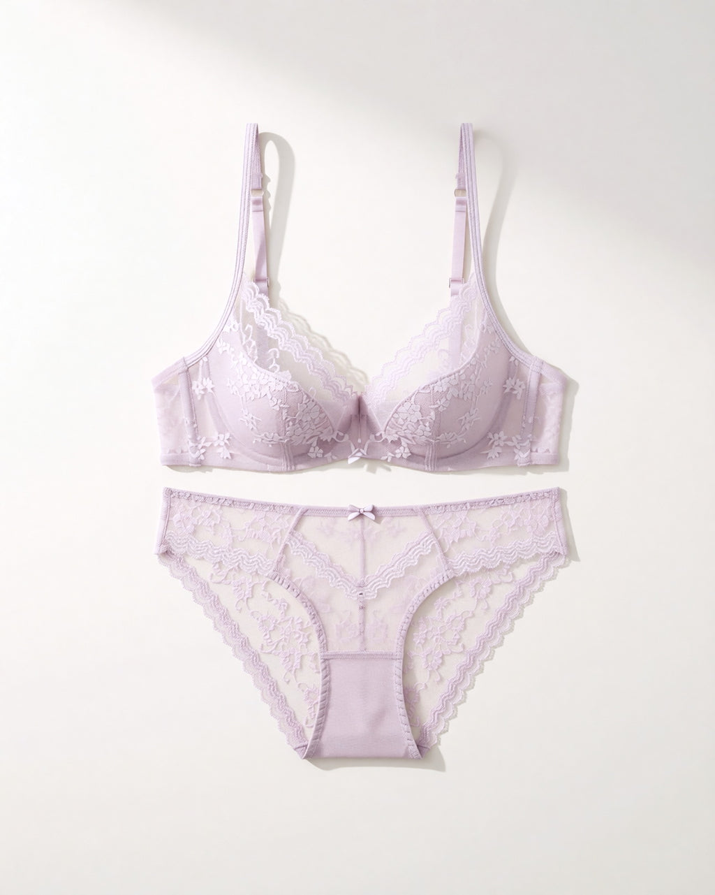 Flat lay of the Darette Deep End Plunge Set in Mauve on a plain surface