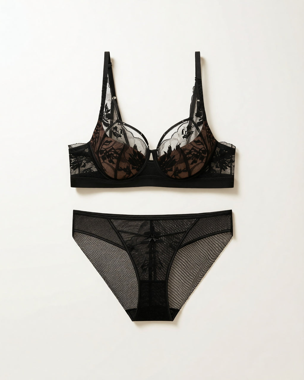 Flat lay of the Darette Sure Thing Lace Set in Noir on a plain surface