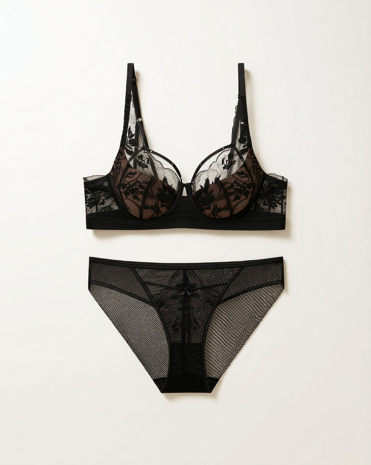 Flat lay of the Darette Sure Thing Lace Set in Noir on a plain surface