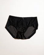 Flat lay of the Darette Bare Minimum Silk Set in Noir on a plain surface
