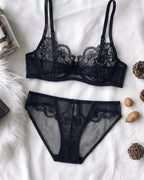 Candid lifestyle shot of the Darette Plain Sight Sheer Set in Noir