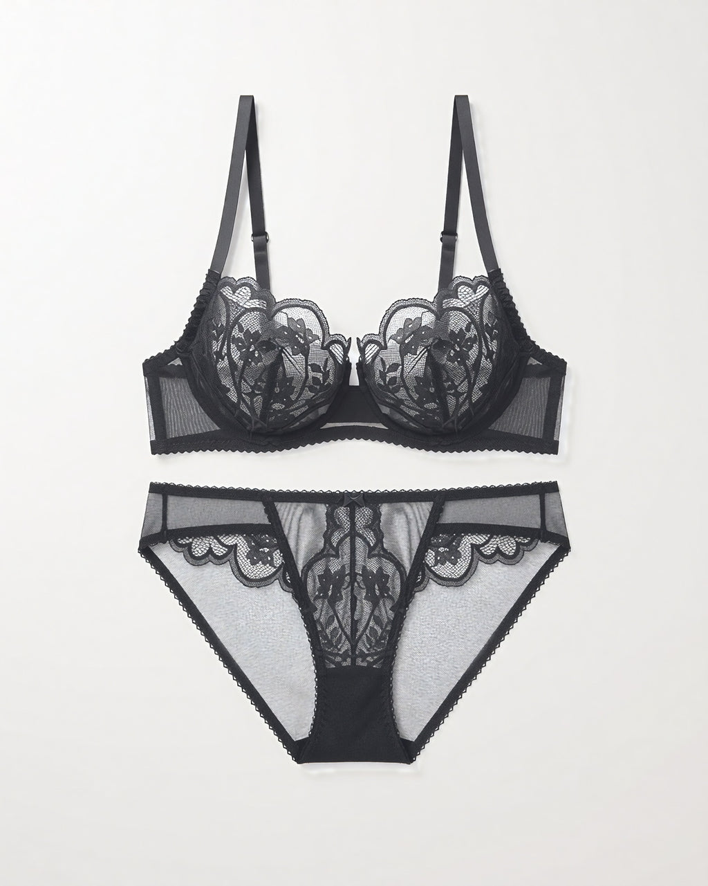 Flat lay of the Darette Plain Sight Sheer Set in Noir on a plain surface