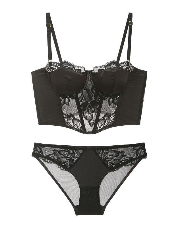 Flat lay of the Darette After Hours Bustier Set in Noir on a plain surface