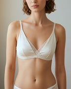 Indoor portrait of a model in the Darette Just Because Silk-Lace Set