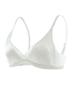 Flat lay of the Darette Just Because Silk-Lace Set in Ivory on a plain surface
