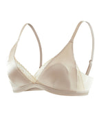 Flat lay of the Darette Just Because Silk-Lace Set in Champagne on a plain surface