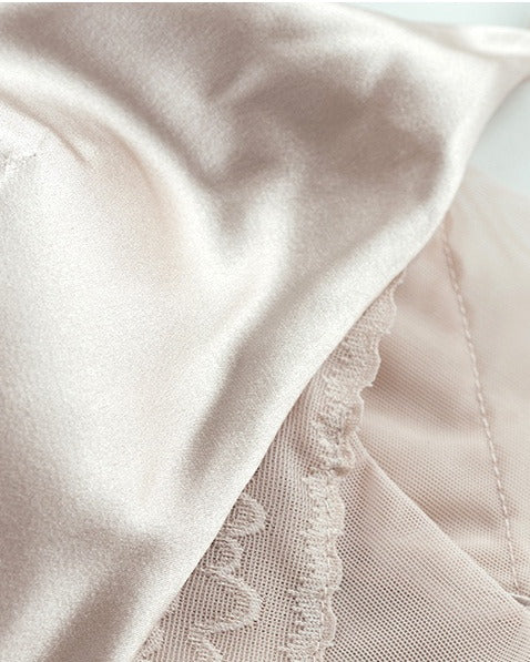 Detail shot of the Just Because Silk-Lace Set, showing the trim and stitching