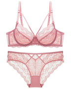 Flat lay of the Darette Small Dare Sheer Set in Blush on a plain surface