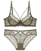 Flat lay of the Darette Small Dare Sheer Set in Moss on a plain surface