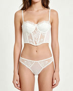 Darette After Hours Bustier Set in Ivory - front view standing in the lace bustier and panty set