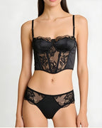 Darette After Hours Bustier Set in Noir - front view standing in the sheer lace bustier and panty set