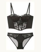 Darette After Hours Bustier Set in Noir - flat lay of the bustier and panty set showing the boning