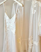 Darette Champagne Problems Satin Slip - flat lay of the satin slip and lace robe on hangers