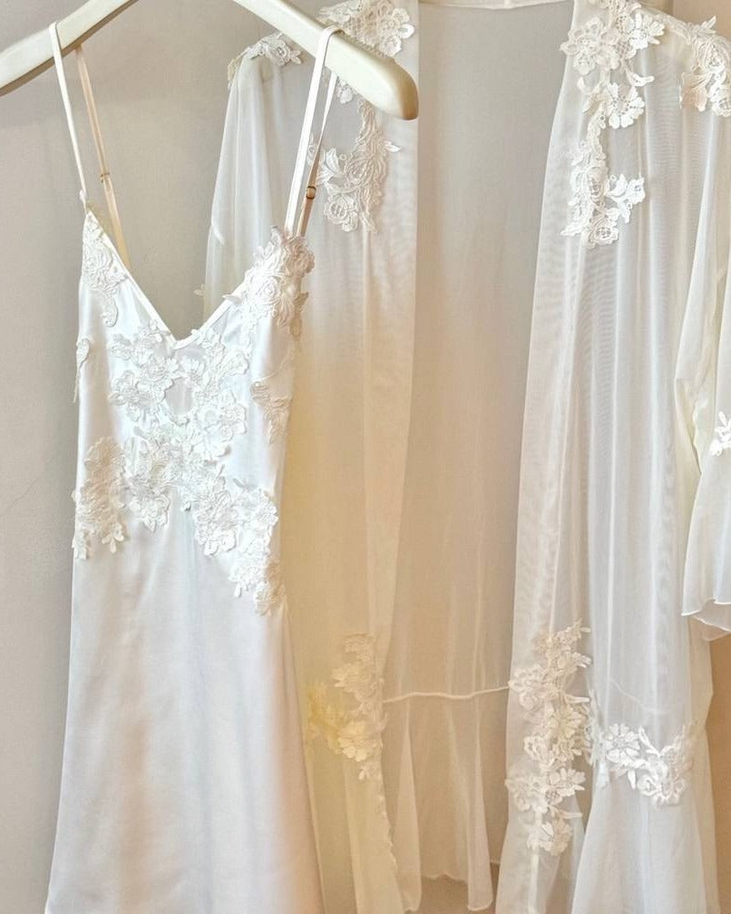 Darette Champagne Problems Satin Slip - flat lay of the satin slip and lace robe on hangers