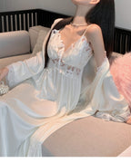 Close-up of the Darette Court of One Set in Ivory - lace bodice and ribbon tie, seated on a sofa