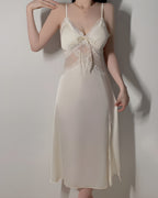 Darette Cover Story Set in Ivory - lace-trimmed slip gown with a front slit, standing against a plain wall