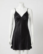 Darette Curtain Call Silk Slip in Noir - satin slip dress on a mannequin, front detail