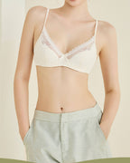 Darette Deep End Plunge Set in Champagne - close-up front view with green trousers