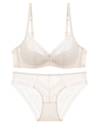 Darette Deep End Plunge Set in Champagne - flat lay of the plunge bra and panty set on a mannequin form