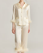 Darette Feather Weight Silk Set in Ivory - satin pajama set with feather cuffs, full-length front view