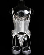 Darette Fine Print Garter Set in Ivory - floral lace bustier and garter belt shown on a form, product view