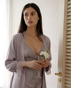 Darette First Light Set in Mauve - robe with lace cuffs over the slip, standing by a doorway