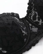 Close-up side view of the Darette Half Truth Half-Cup Set bra in Noir, showing the scalloped lace edge