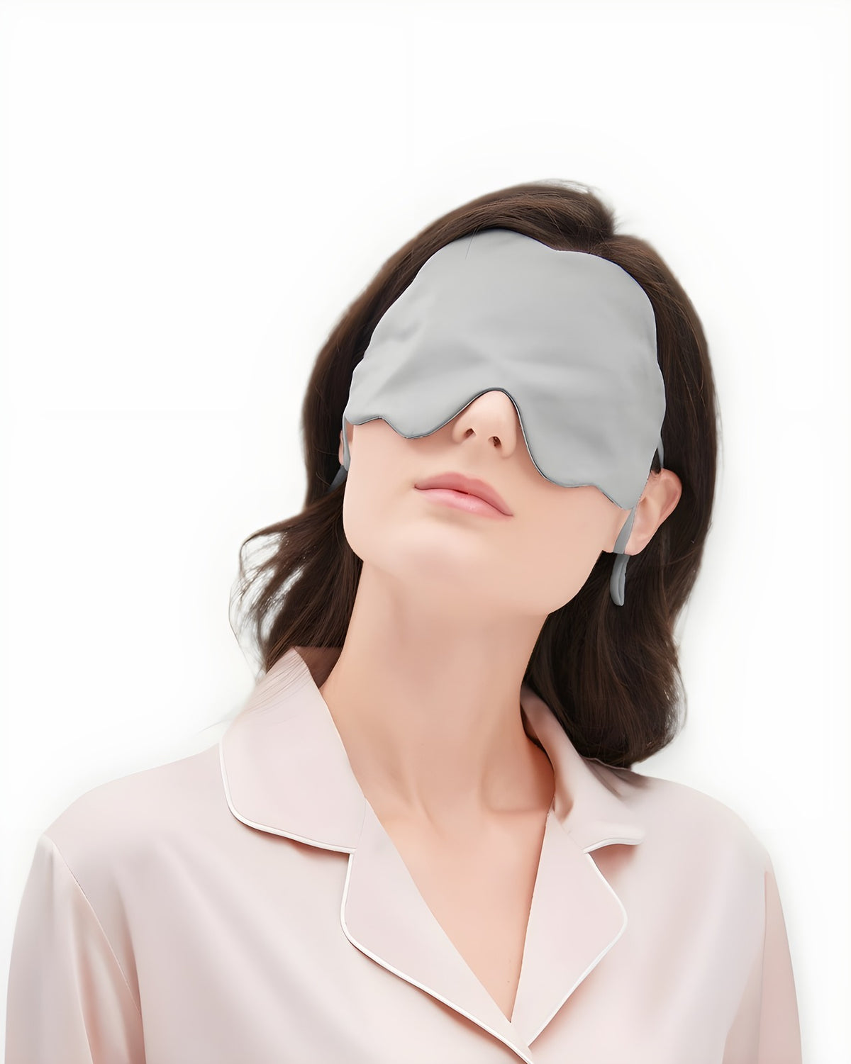 Darette Lights Out Silk Eye Mask in Mist worn by a model in silk pajamas, front view