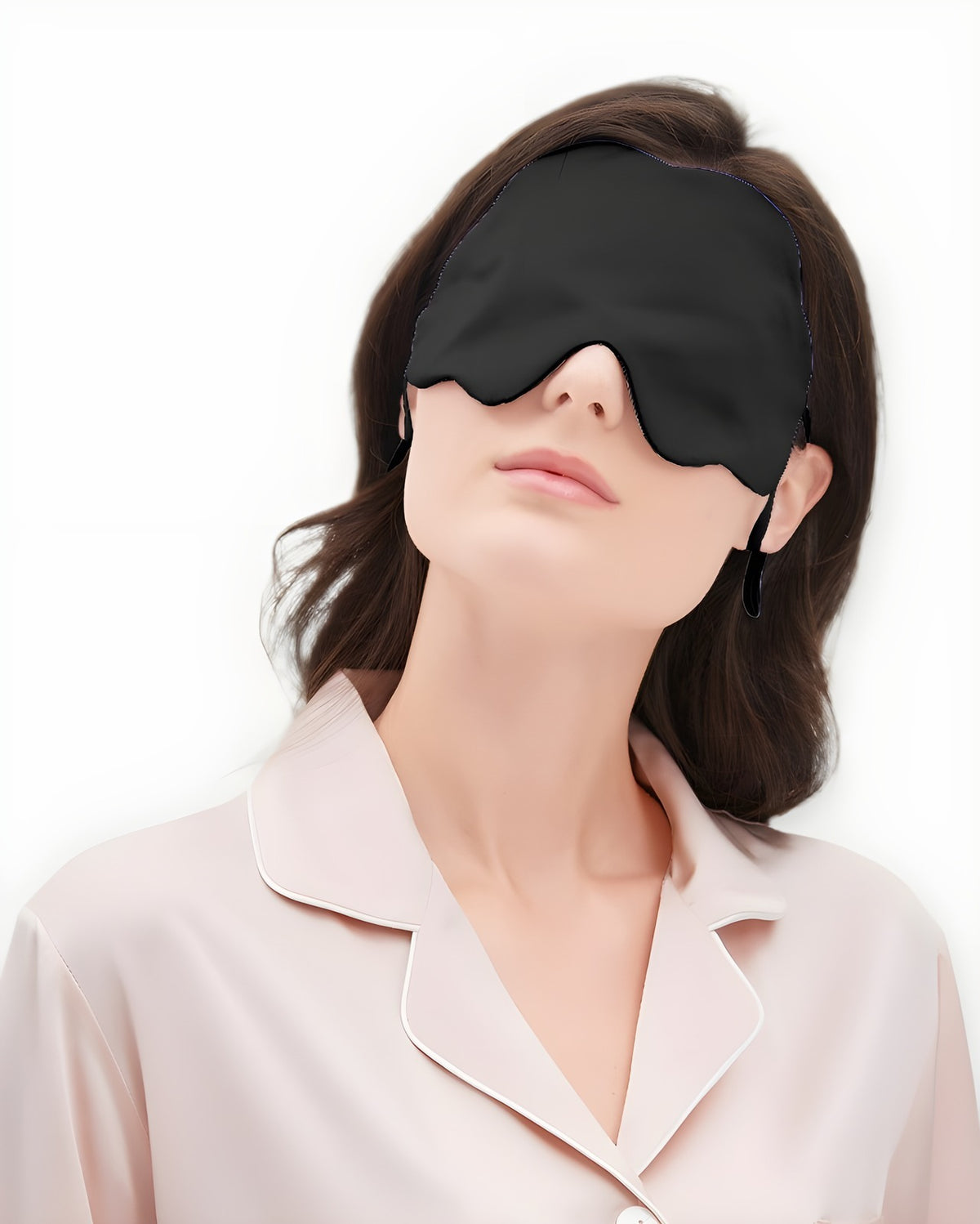 Darette Lights Out Silk Eye Mask in Noir worn by a model in silk pajamas, front view