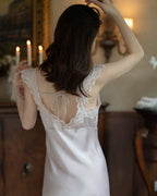 Back view of the Darette Long Story Slip in Mauve - lace-trimmed open back with a tie closure