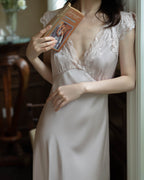 Darette Long Story Slip in Mauve - front view holding a book, showing the lace V-neck bodice