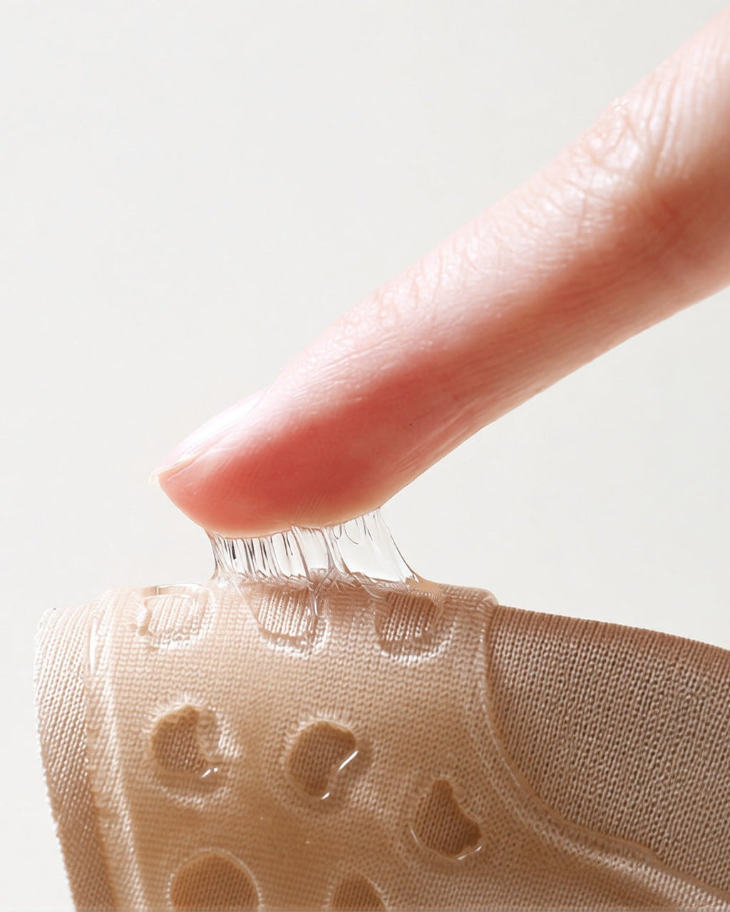 Close-up of the Darette Off the Record Covers in Nude - textured adhesive backing