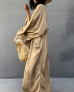 Darette Out of Office Cover-Up in Champagne - flowing kimono-style robe, side view with a woven tote