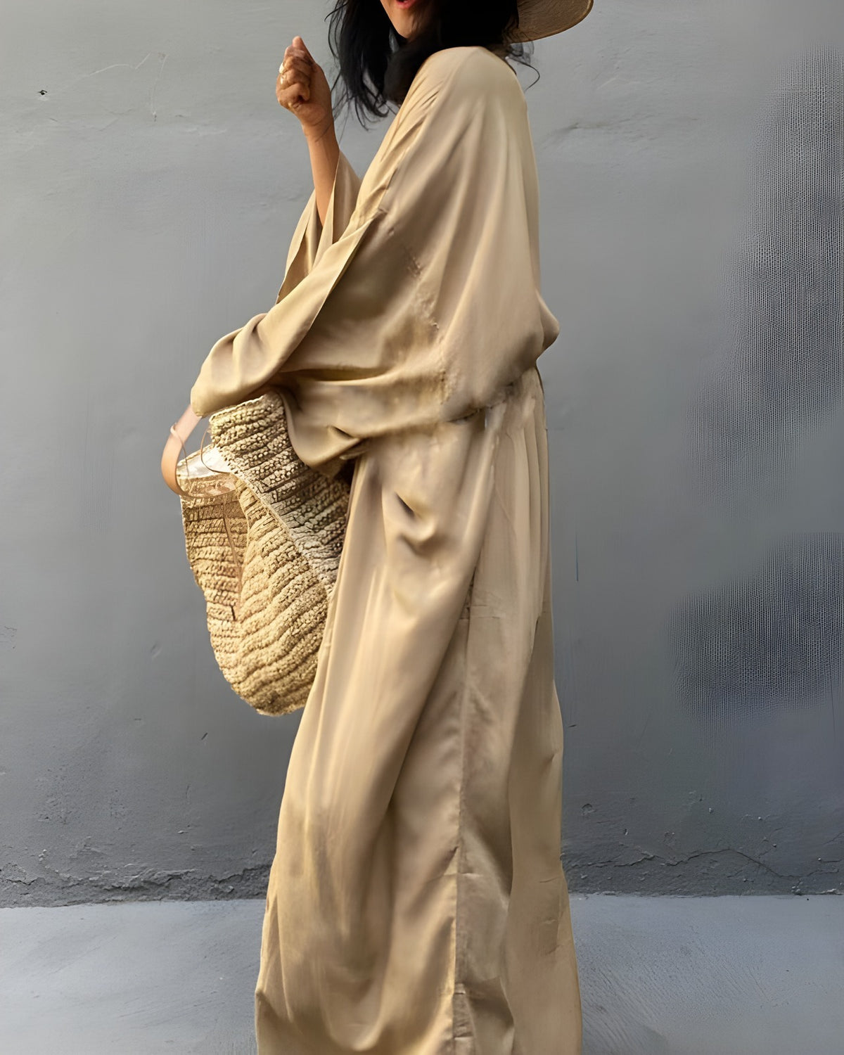 Darette Out of Office Cover-Up in Champagne - flowing kimono-style robe, side view with a woven tote