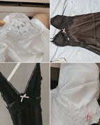 Flat lay details of the Darette Room Service Set - lace bodice, satin slip, and robe fabric in Ivory and Noir